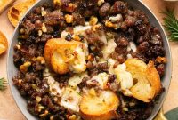Sausage-Stuffed Baked Brie with Honey and Herbs