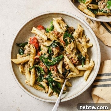 Creamy Tuna Pesto Pasta Recipe for Quick Weeknight Meals 18 Two bowls of tuna pesto pasta.