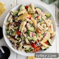 Top down view of a large bowl of Greek pasta salad.