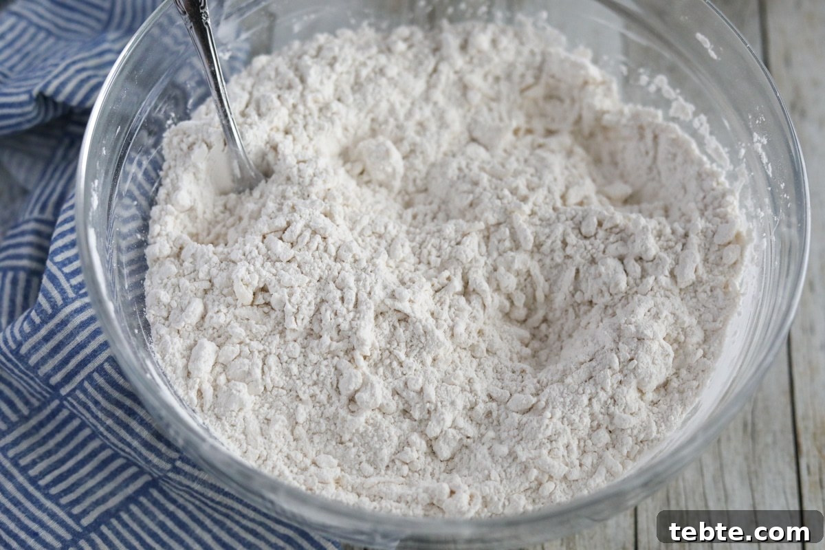 Flaky Homemade Biscuits Recipe — From Scratch and Delicious 4 butter and self-rising flour combined into a crumbly dough