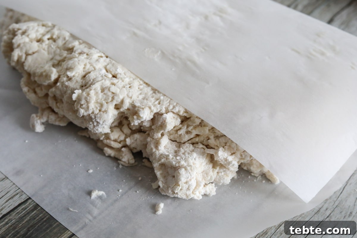 Flaky Homemade Biscuits Recipe — From Scratch and Delicious 7 the dough being folded on top of itself
