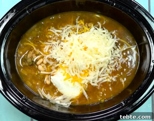 Shredded cheese added.