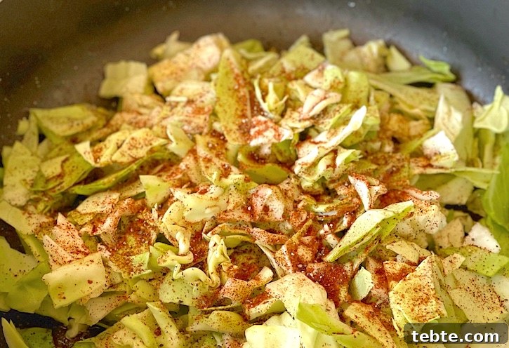 Sausage and Cabbage Skillet Dinner Recipe for Quick Weeknights 7 Easy and cheap cabbage dinner idea! This low carb dinner skillet is filled with cajun sausage and is super easy to make.