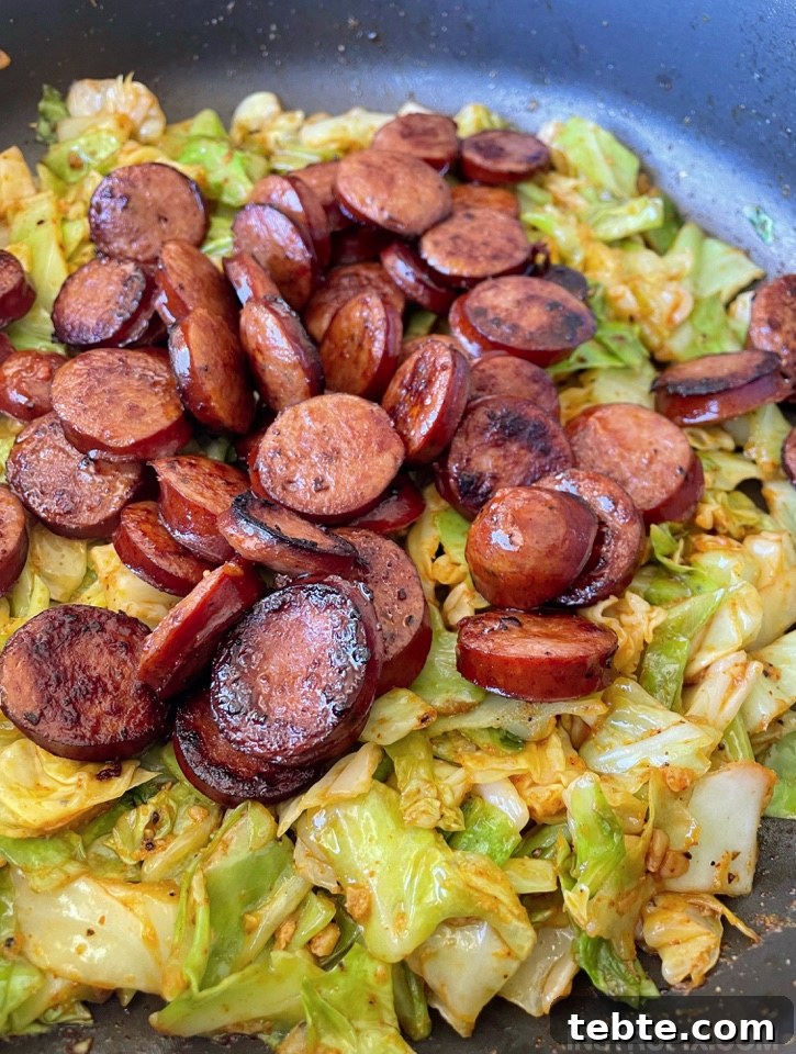 Sausage and Cabbage Skillet Dinner Recipe for Quick Weeknights 8 Keto Sausage & Cabbage Dinner Recipe (A super quick and easy one pan meal!) | If you're looking for healthy low carb dinner recipes, you've got to add this to your meal plan! It's perfect for busy weeknight meals. Super fast to throw together in just one pan!