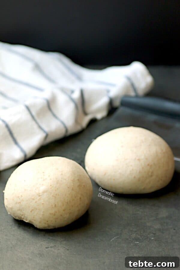 Two balls of homemade pizza dough