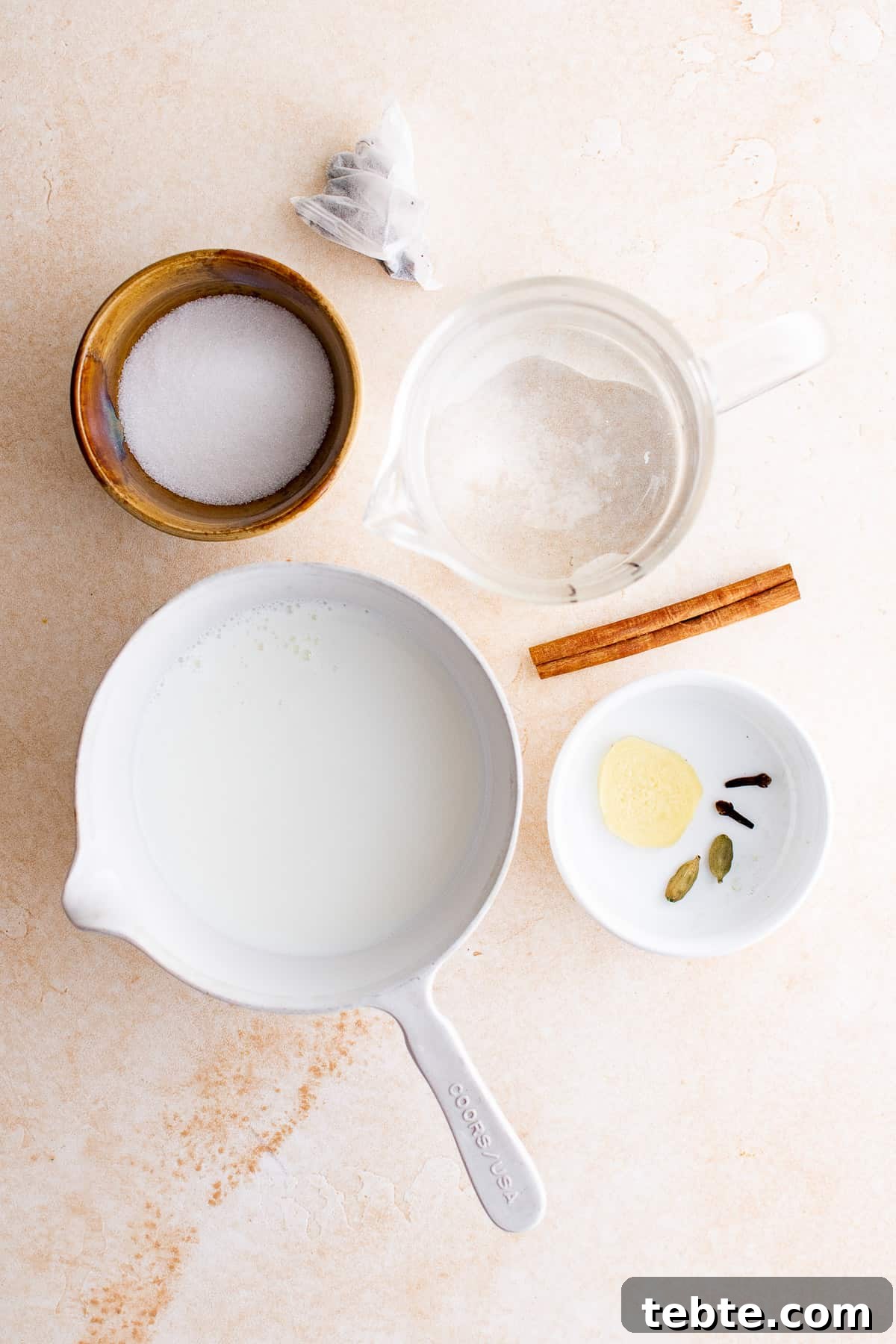 Refreshing Iced Chai Latte Recipe for Creamy Spiced Iced Tea 3 Top down view of ingredients needed for chai latte.