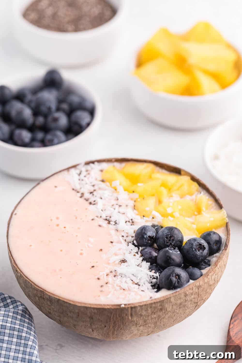 Citrus Grapefruit Smoothie Bowl Recipe for Bright Breakfast 3 Grapefruit Smoothie Bowl - This easy smoothie bowl recipe is healthy and naturally sweet way to kickstart your mornings. It's made with creamy blend of Sweet Scarletts Texas Red Grapefruit, Greek Yogurt, pineapple and a banana. Top it with some fresh blueberries, seeds and coconut. Yum!