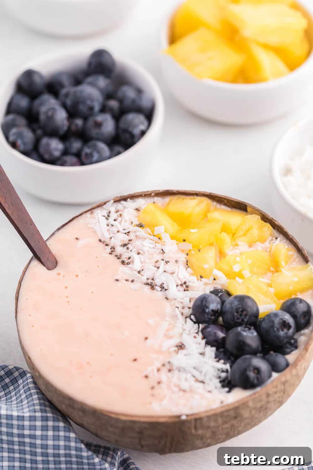 Citrus Grapefruit Smoothie Bowl Recipe for Bright Breakfast 5 Grapefruit Smoothie Bowl - This easy smoothie bowl recipe is healthy and naturally sweet way to kickstart your mornings. It's made with creamy blend of Sweet Scarletts Texas Red Grapefruit, Greek Yogurt, pineapple and a banana. Top it with some fresh blueberries, seeds and coconut. Yum!