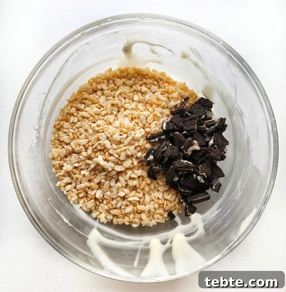 Oreo Rice Krispie Treats Recipe: Cookies & Cream Marshmallow Bars 5 add in the rice krispie cereal and chopped oreos