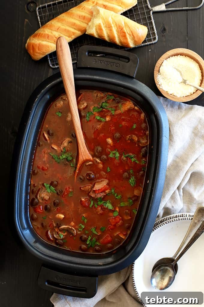 A balsamic vinegar spiked broth is the base of this Slow Cooker Mediterranean Beef Stew that's dotted with stew meat, tomatoes, mushrooms, olives and capers. Each bowl of this rich and hearty stew is then sprinkled with fresh parsley and grated Parmesan cheese which helps to brighten the flavors as well as to really up the flavor ante.