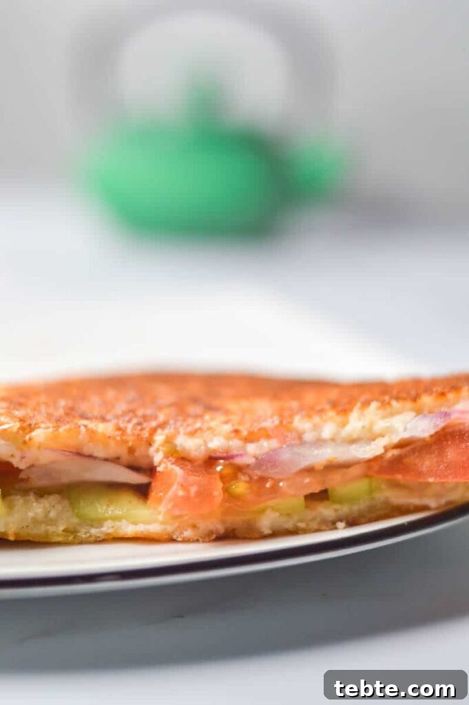 5-Minute Masala Sandwich Recipe: Spicy Indian Toasted Sandwich 4 A single vegetable sandwich half
