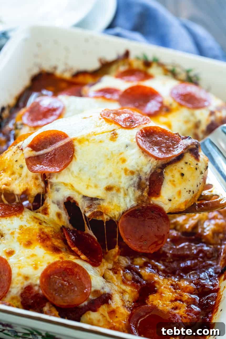 Low Carb Pizza Chicken baked in a casserole dish