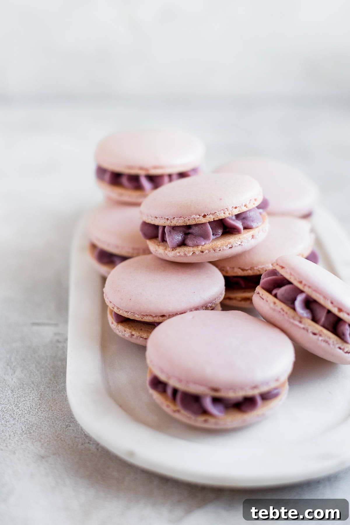 macarons piled on platter