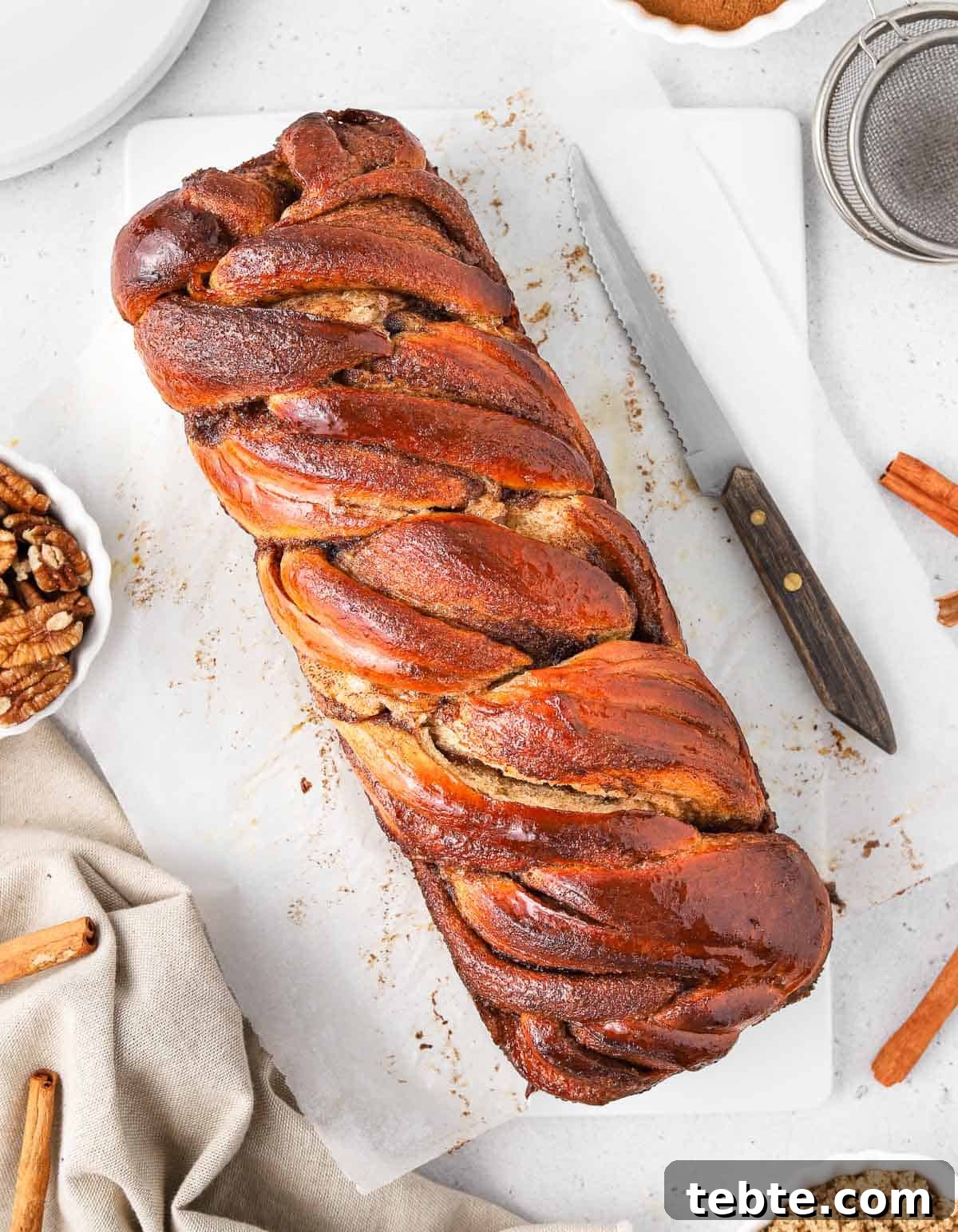 Cinnamon Babka Recipe: Soft, Swirled Brioche Loaf 8 Babka seen from above on a white tray.