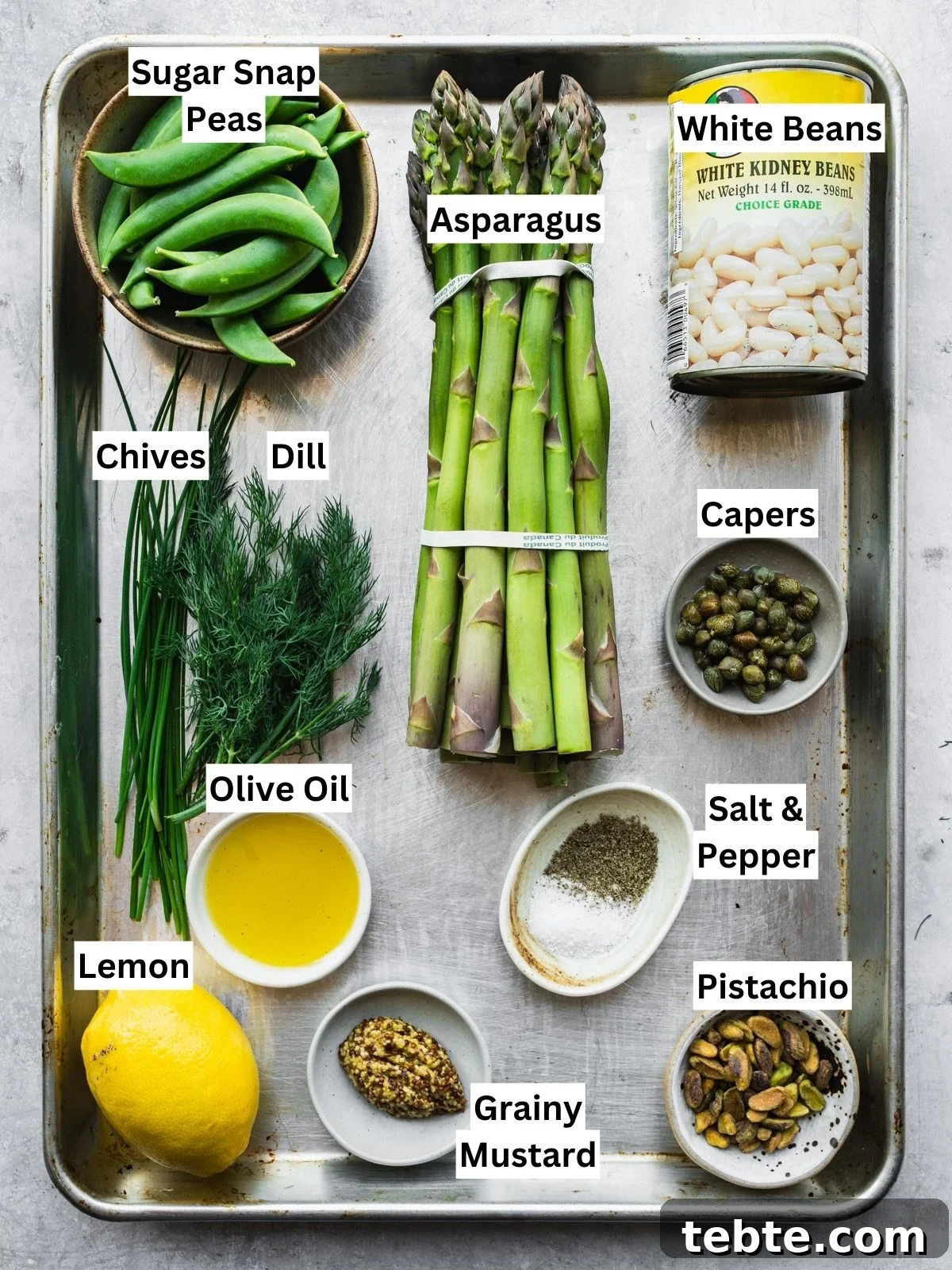 Grilled Asparagus and White Bean Salad with Lemon Vinaigrette 3 Grilled Asparagus and White Bean Salad ingredients with individual labels in a tray.