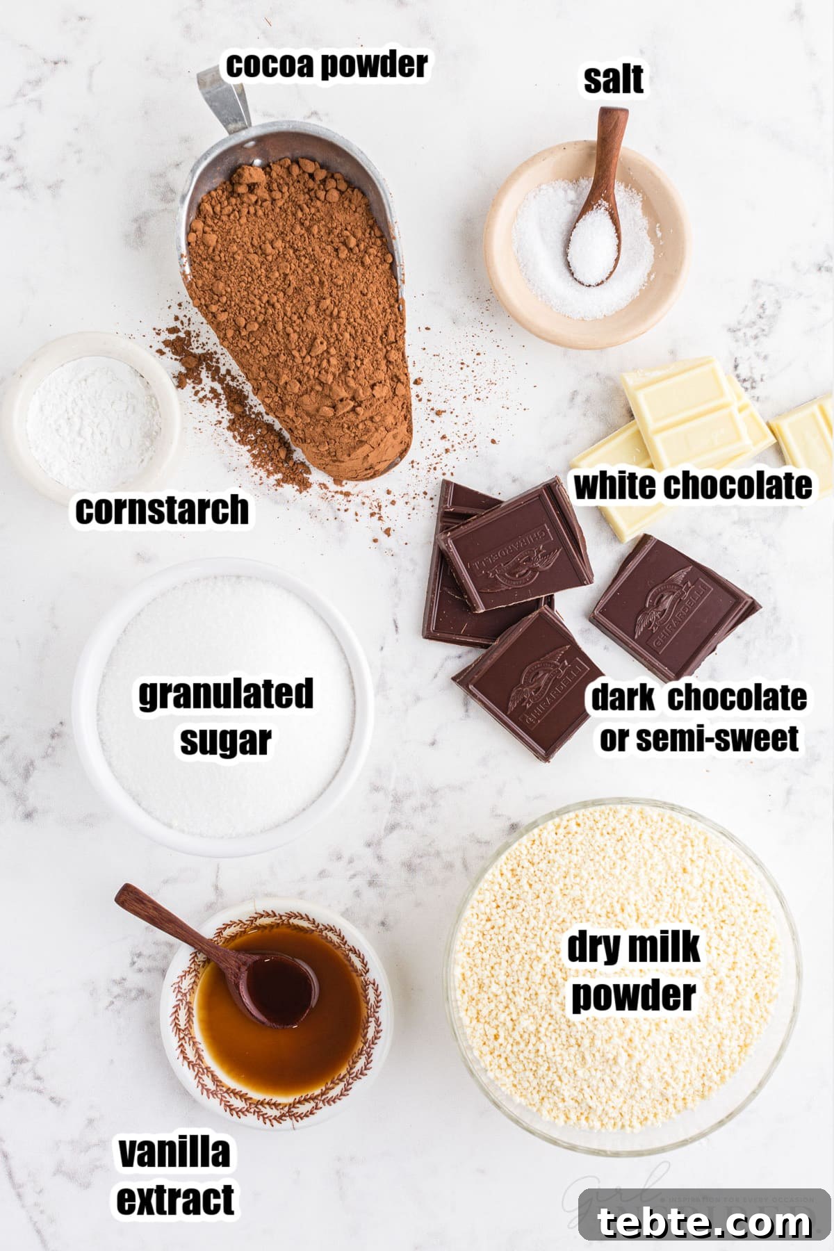 DIY Hot Cocoa Mix Recipe for Rich, Creamy Hot Chocolate 4 Individual ingredients for homemade hot cocoa mix.