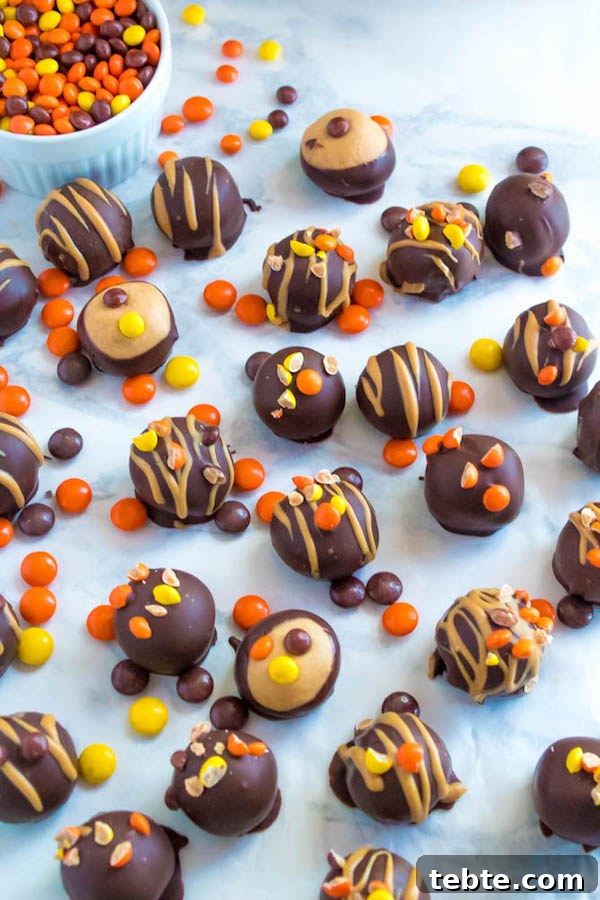 Reese’s Pieces Peanut Butter Truffle Recipe for Candy Lovers 4 Reese's Pieces Peanut Butter Truffles— smooth and creamy peanut butter balls, loaded with mini Reese's Pieces, coated with dark chocolate and drizzled with melted peanut butter!