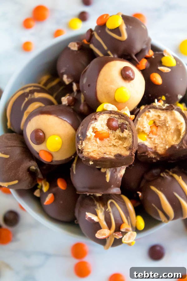 Reese’s Pieces Peanut Butter Truffle Recipe for Candy Lovers 5 Reese's Pieces Peanut Butter Truffles— smooth and creamy peanut butter balls, loaded with mini Reese's Pieces, coated with dark chocolate and drizzled with melted peanut butter!