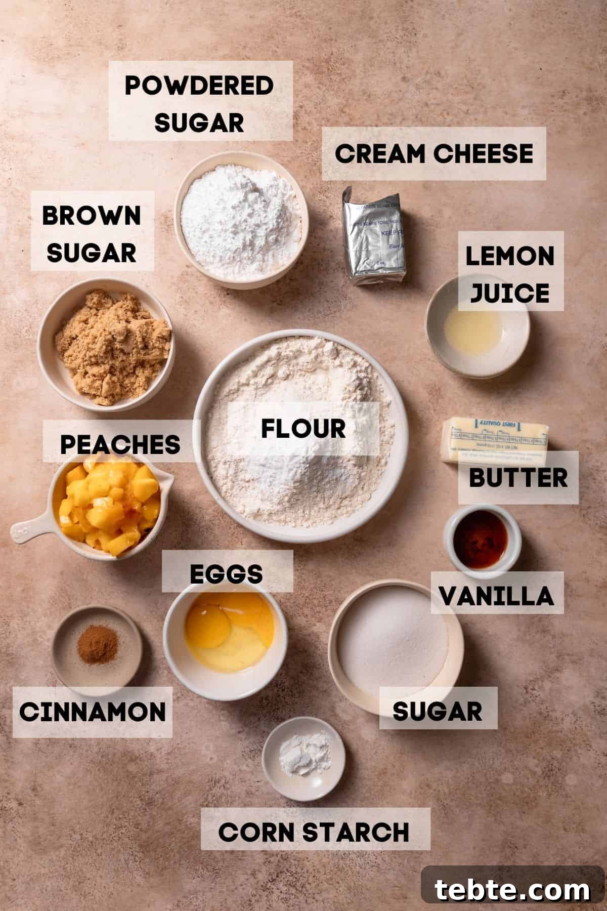 ingredients needed to make peach cookies in bowls with labels.