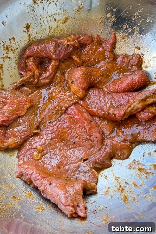 Cuban Bistec de Palomilla: Tender Steak with Onions Recipe 3 thinly sliced sirloin steak marinating in citrus and seasonings