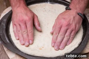 Crispy Garlic Pizza Bread Recipe — Cheesy Garlic Pull-Apart Loaf 12 Placing the Pizza Bread onto around oven pizza tray by hands