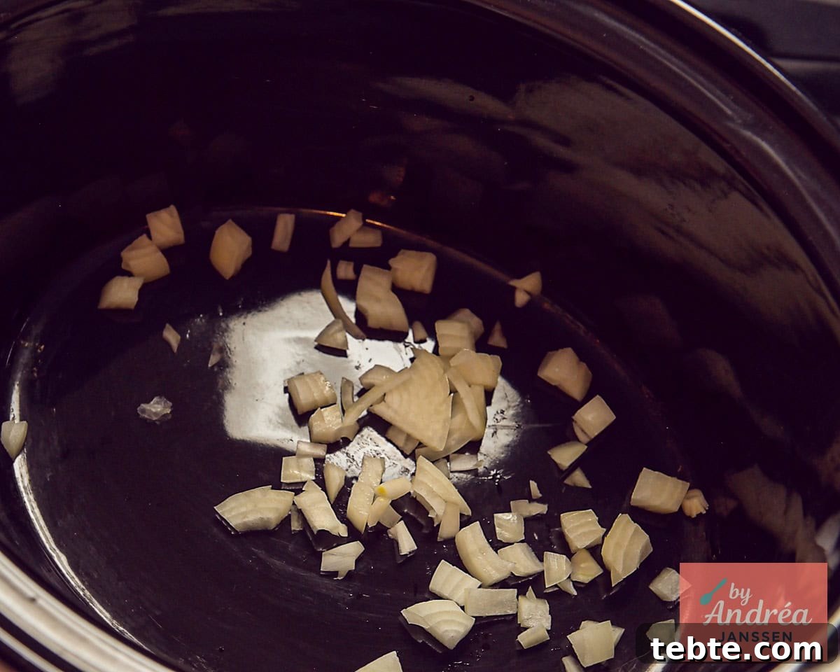 Slow-Cooker French Ham Steak Stew Recipe 4 Put sliced onions on the bottom of the slow cooker