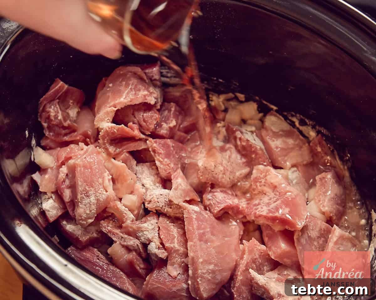 Slow-Cooker French Ham Steak Stew Recipe 6 Pour rose wine into the slow cooker.