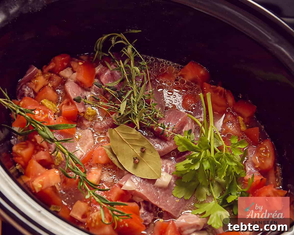 Slow-Cooker French Ham Steak Stew Recipe 7 Add tomatoes, fresh herbs stock and bay leaves