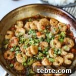 Teriyaki Broccoli and Shrimp stir fry in skillet.