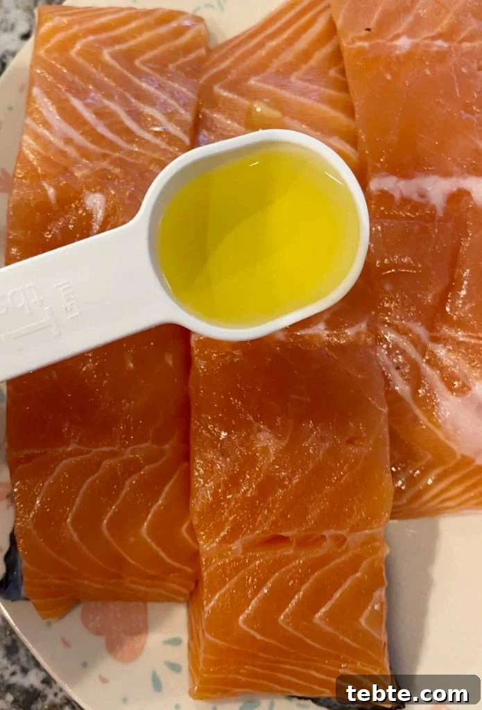 pour avocado oil on salmon