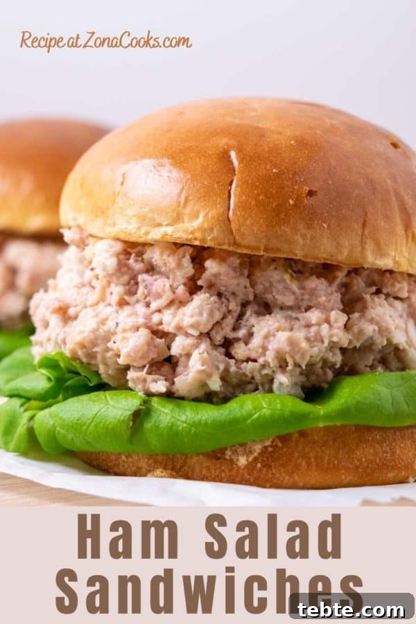 Classic Ham Salad Sandwich Recipe for Quick Lunch Ideas 2 a sandwich roll filled with lettuce and ham salad spread and text reading recipe at zonacooks.com ham salad sandwiches