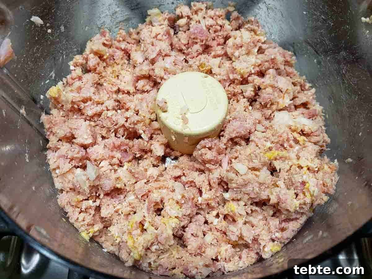 Classic Ham Salad Sandwich Recipe for Quick Lunch Ideas 3 a food processor filled with finely chopped ham salad