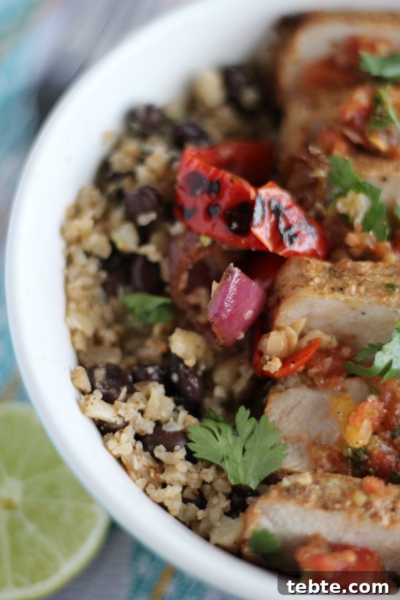 Grilled Pork Burrito Bowls - a grain-free, gluten-free, and dairy-free meal that is loaded with flavor from grilled pork, mango guacamole, and fresh salsa! | fedandfulfilled.com