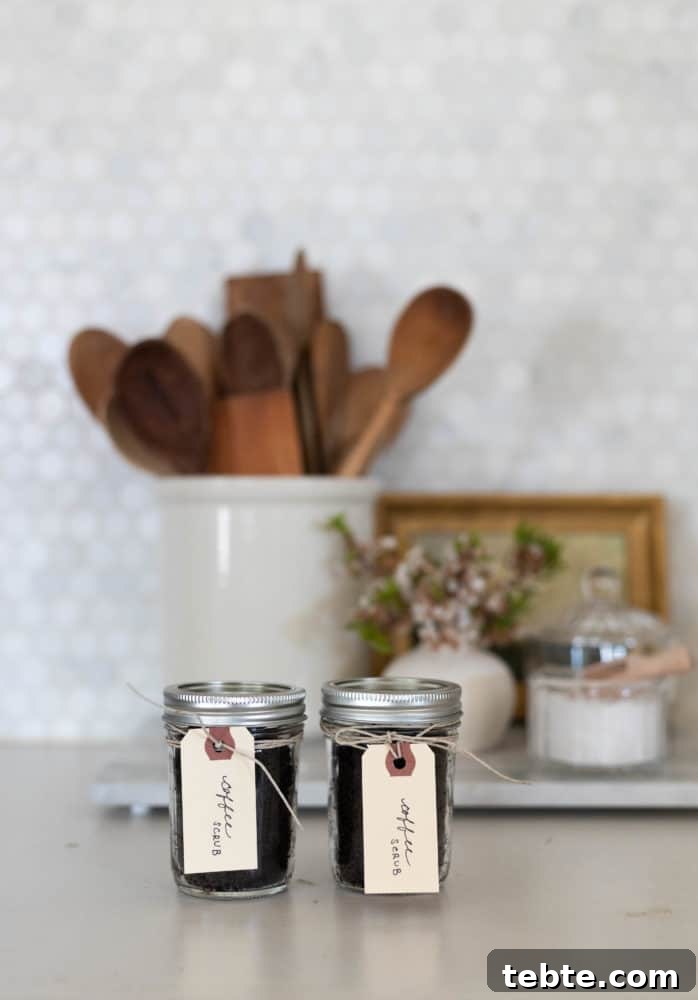 Coconut Coffee Scrub DIY: Glow-Boosting Body & Face Exfoliant 4 2 jars of DIY Coconut Coffee Scrub sitting on counter.