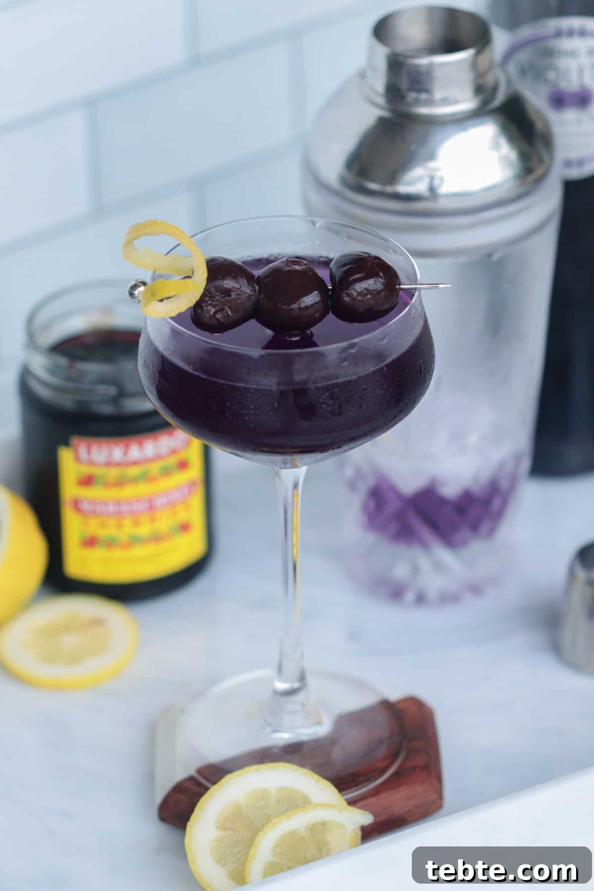 12 Crème de Violette Cocktails to Try Tonight 3 Aviation cocktail with bourbon cherries.