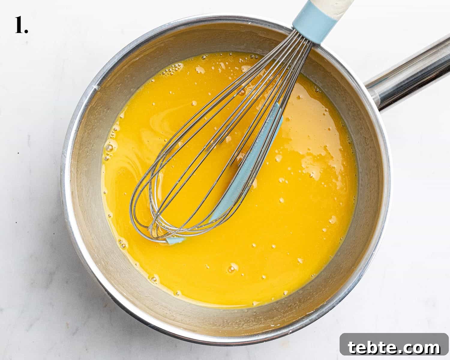 Vibrant Vegan Passion Fruit Curd Recipe for Tarts & Toast 5 Step 1, the passion fruit puree in a pan.