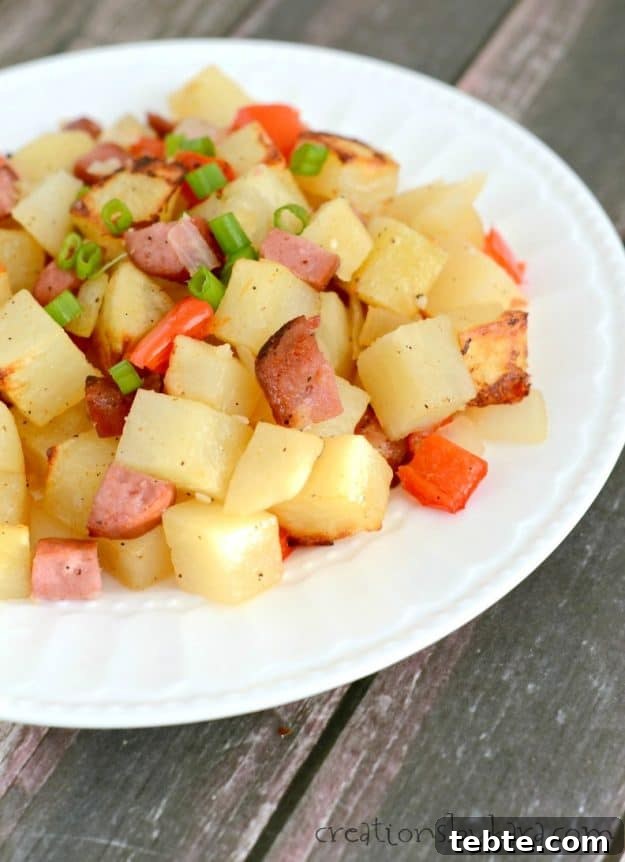 One pan Sausage Potato Bake makes a simple and delicious dinner! Everyone will love this recipe!