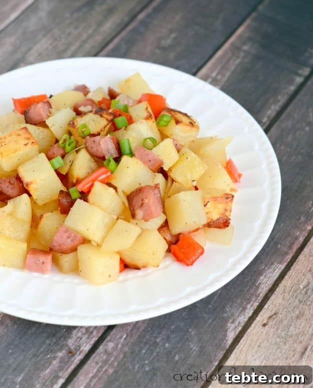 Roasted Smoked Sausage and Potatoes - an easy dinner recipe that satisfy even the heartiest of appetites! 