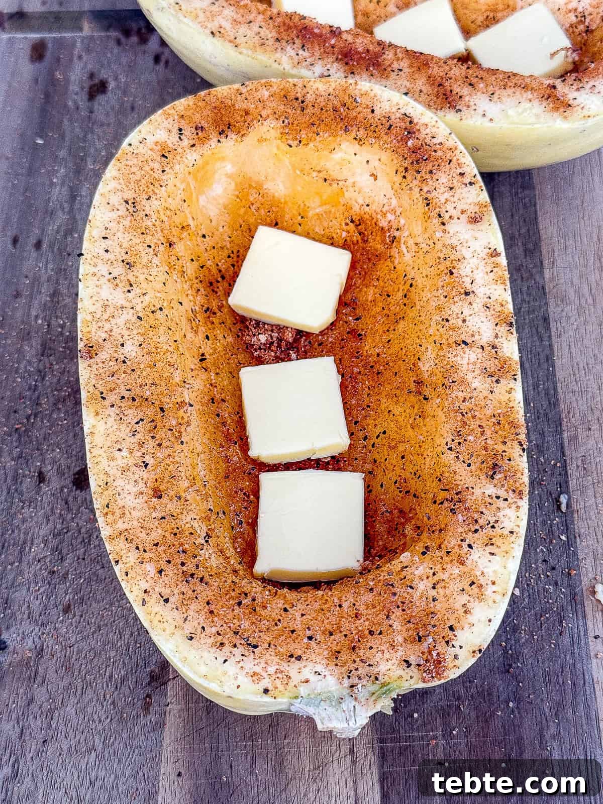 Smoked Spaghetti Squash Recipe for Traeger Grill 5 Raw Spaghetti Squash with BBQ rub and butter