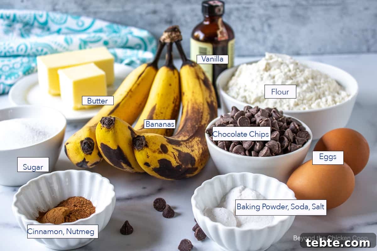 Ripe bananas in the center of small bowls filled with flour, sugar and other ingredients.