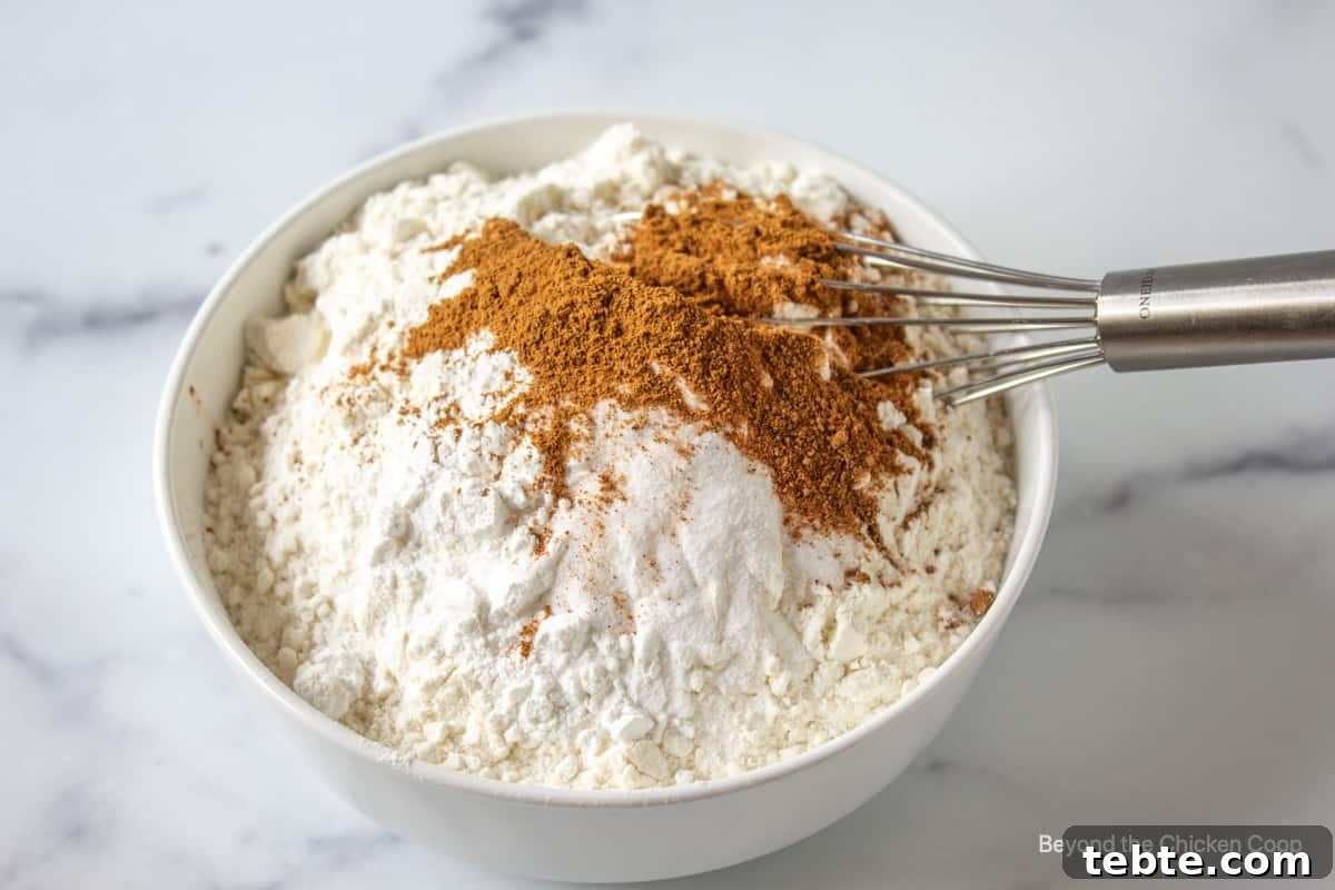 A small bowl filled with flour and spices.