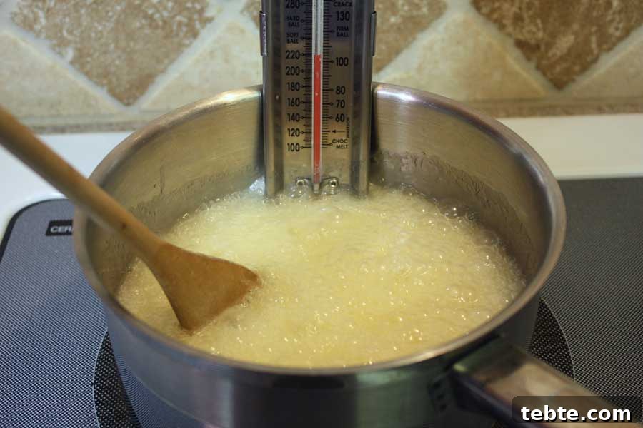 Classic English Toffee Recipe: Crispy, Buttery Homemade Treat 3 Ingredients for candy in a saucepan boiling.