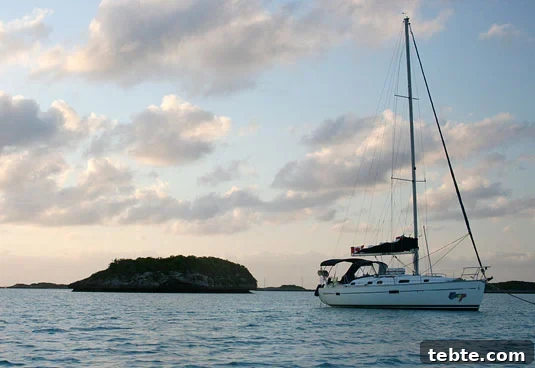Our sailboat, the Congo, as the sun sets on Warderick Wells Cay. Our sailboat, the Congo, as the sun sets on Warderick Wells Cay.