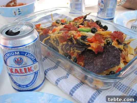 Nachos go well with a refreshing Kalik, the beer of the Bahamas! Nachos go well with a refreshing Kalik, the beer of the Bahamas!