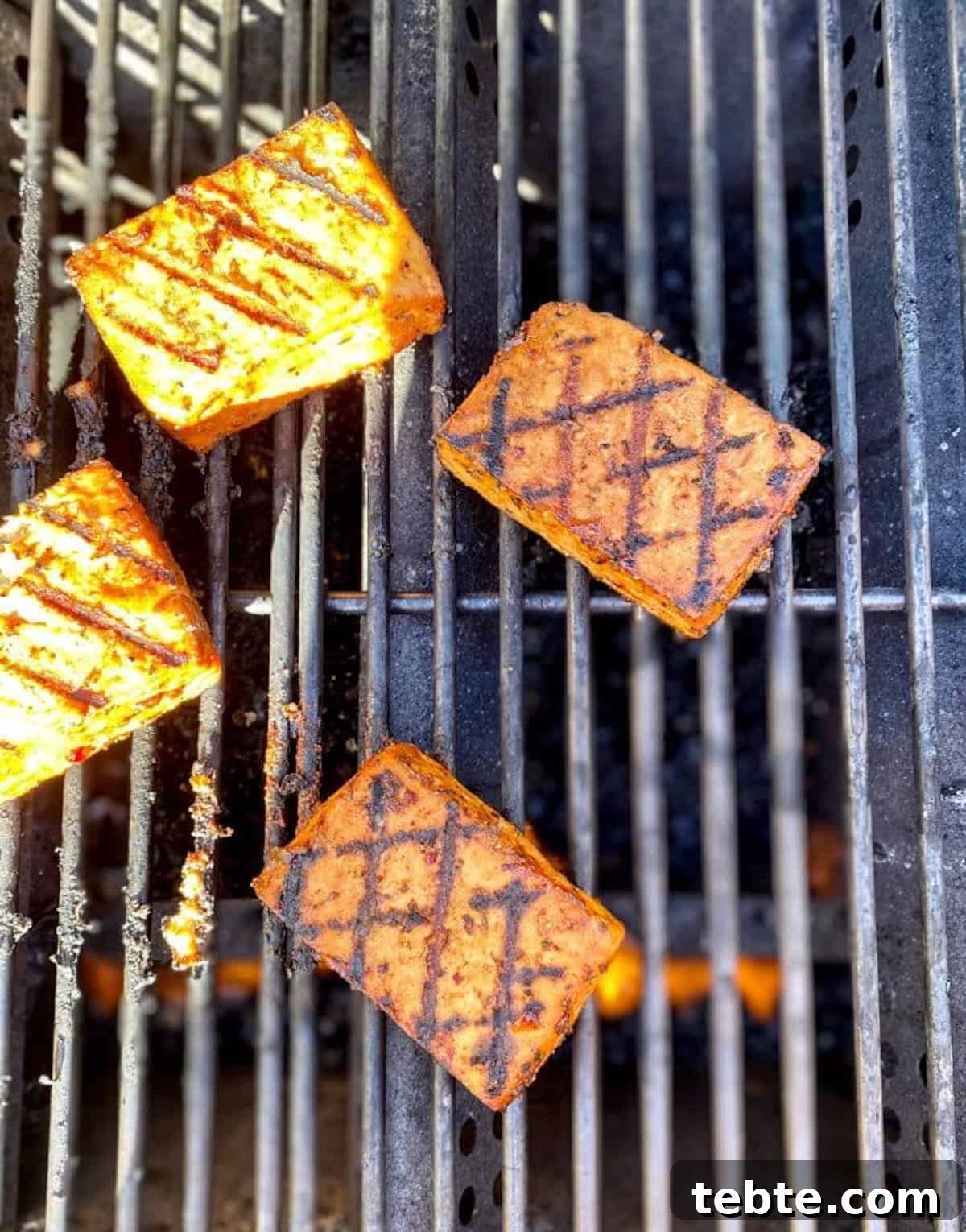 I am learning to grill tofu on the gas grill grates. 