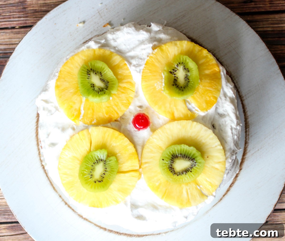 Tropical Layered Poke Cake Recipe With Coconut and Pineapple 6 Tropical Layered Poke Cake