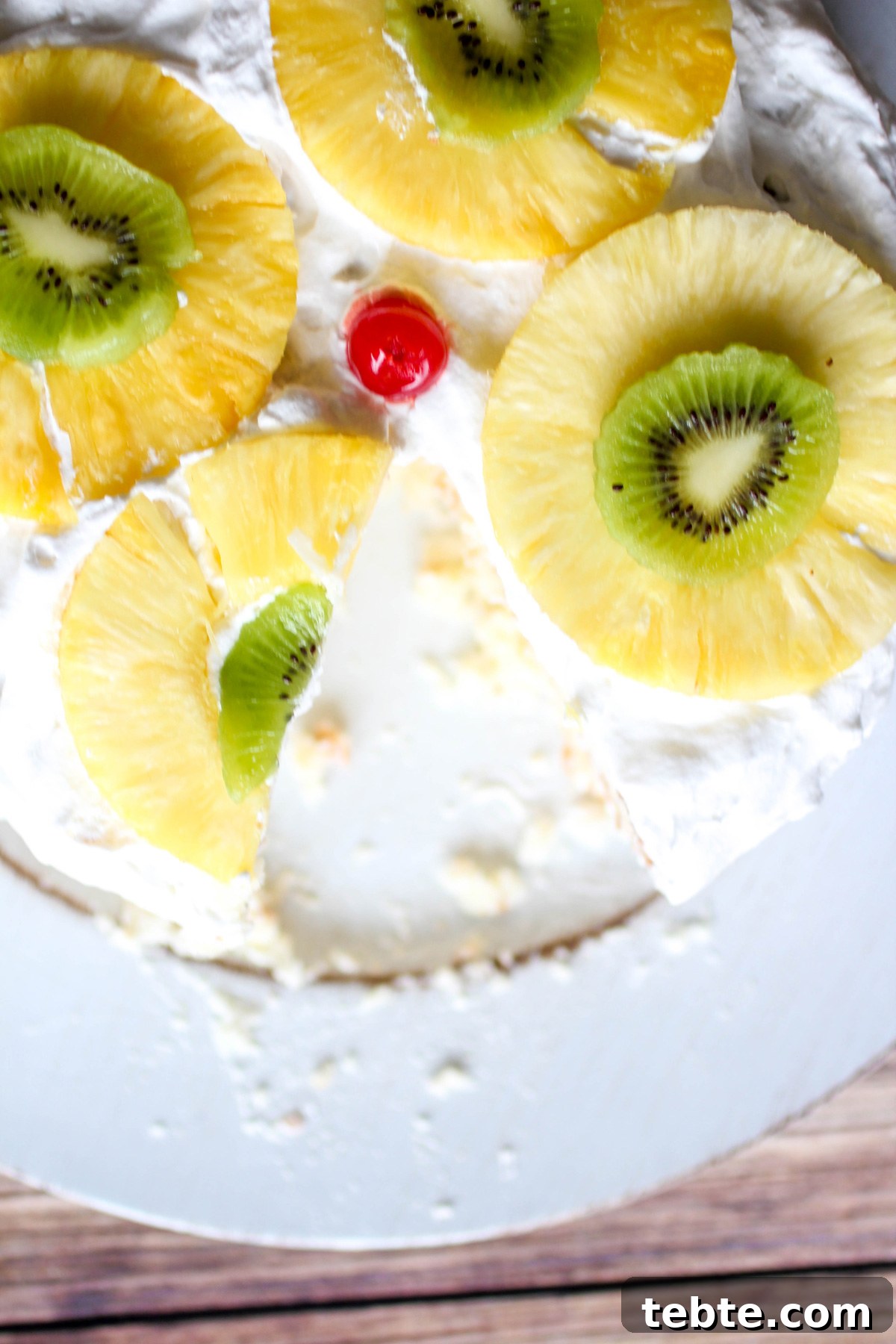 Tropical Layered Poke Cake Recipe With Coconut and Pineapple 7 Tropical Layered Poke Cake