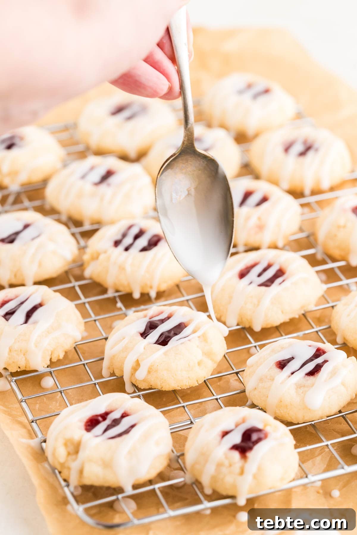 Raspberry Almond Shortbread Cookies Recipe — Buttery Jam-Filled Treats 14 Iced cookies