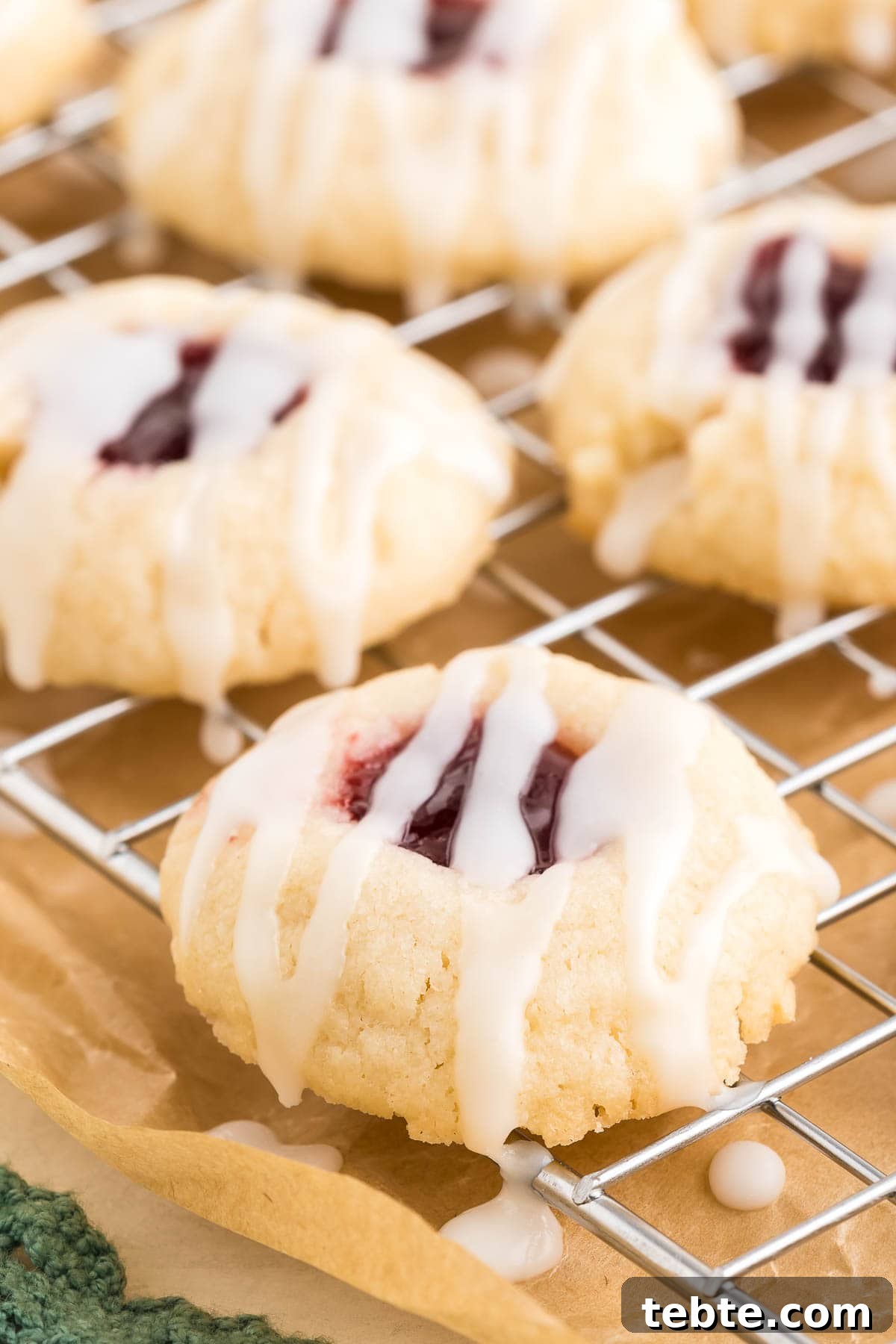 Raspberry Almond Shortbread Cookies Recipe — Buttery Jam-Filled Treats 15 Cookies plated