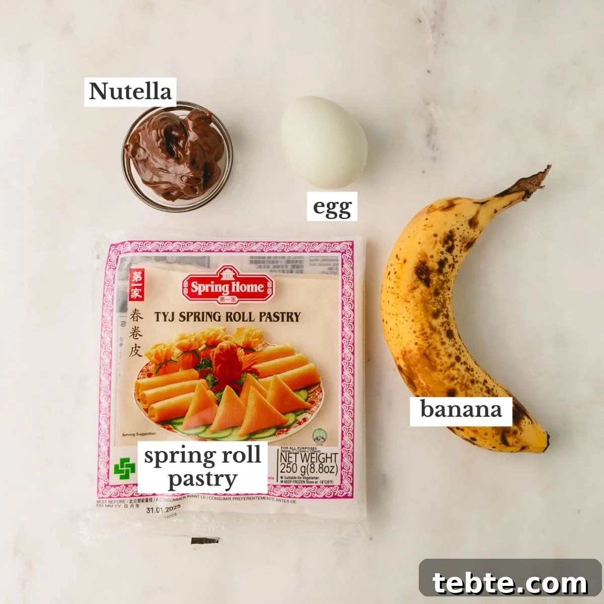Crispy Banana and Nutella Wontons Recipe for Dessert Delight 4 Nutella, an egg, a ripe banana, and a bag of spring roll wrappers.